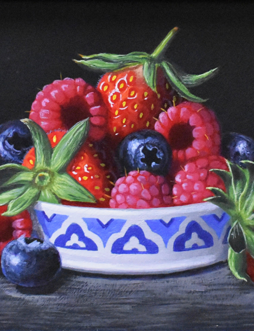 still life painting of a white and blue ceramic bowl of lemons with a peeled lemon on the table on a dark background