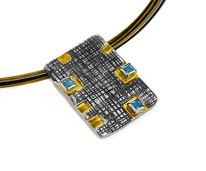 Stylish Topaz, Gold & Oxidized Pendant