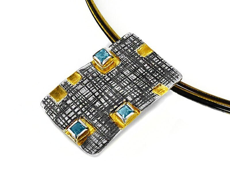 Stylish Topaz, Gold & Oxidized Pendant