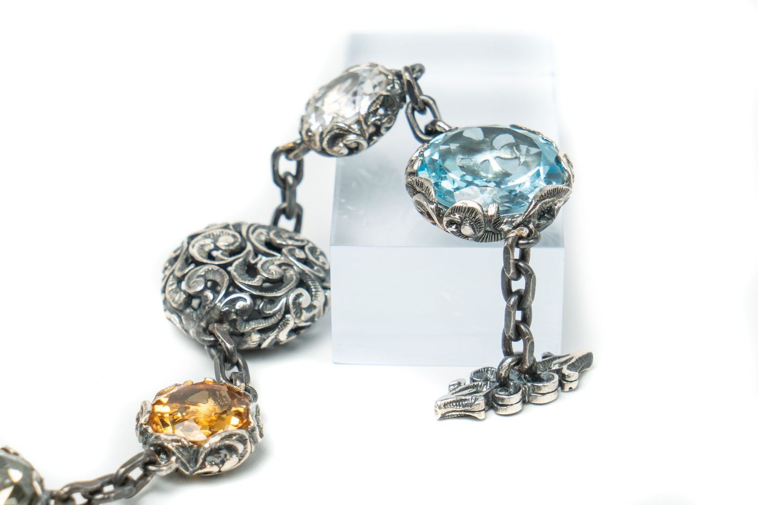 Silver Bracelet With Mixture of Gems.