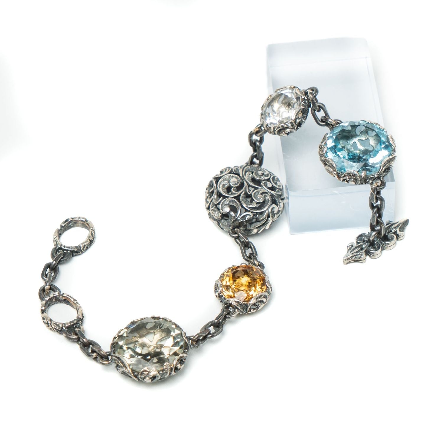 Silver Bracelet With Mixture of Gems.