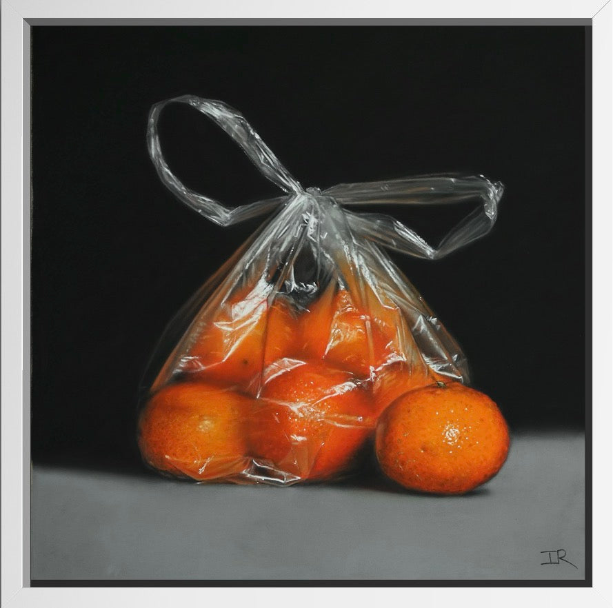 framed pastel drawing of Bag of oranges with a clear plastic wrap on a dark background