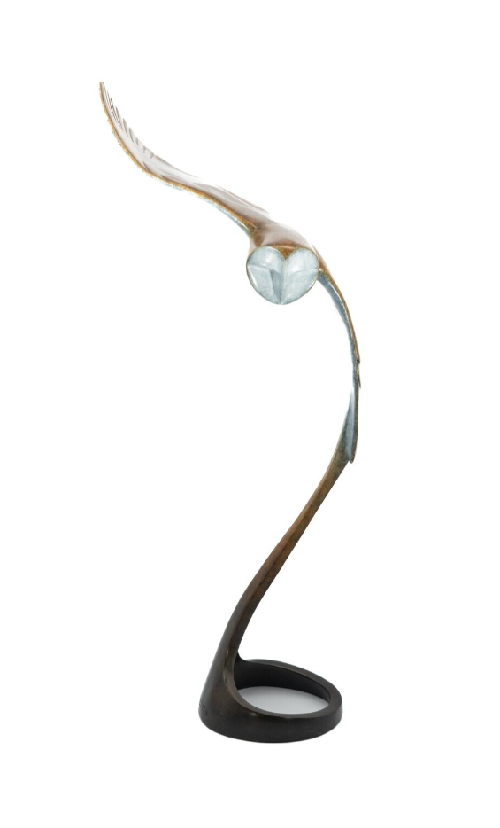 Decorative sculpture with curved design on a white background