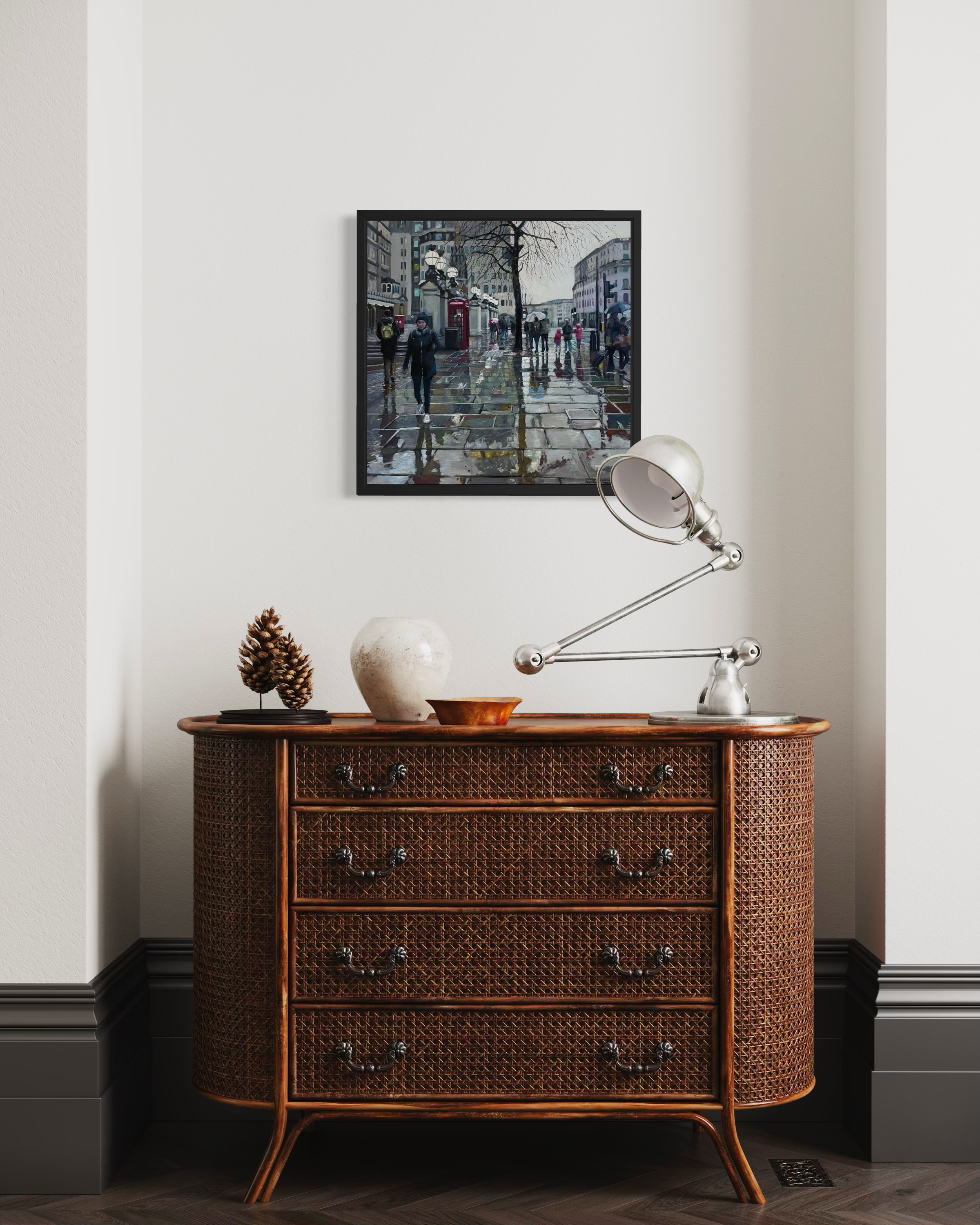 Wicker dresser with original london city scene against a white wall