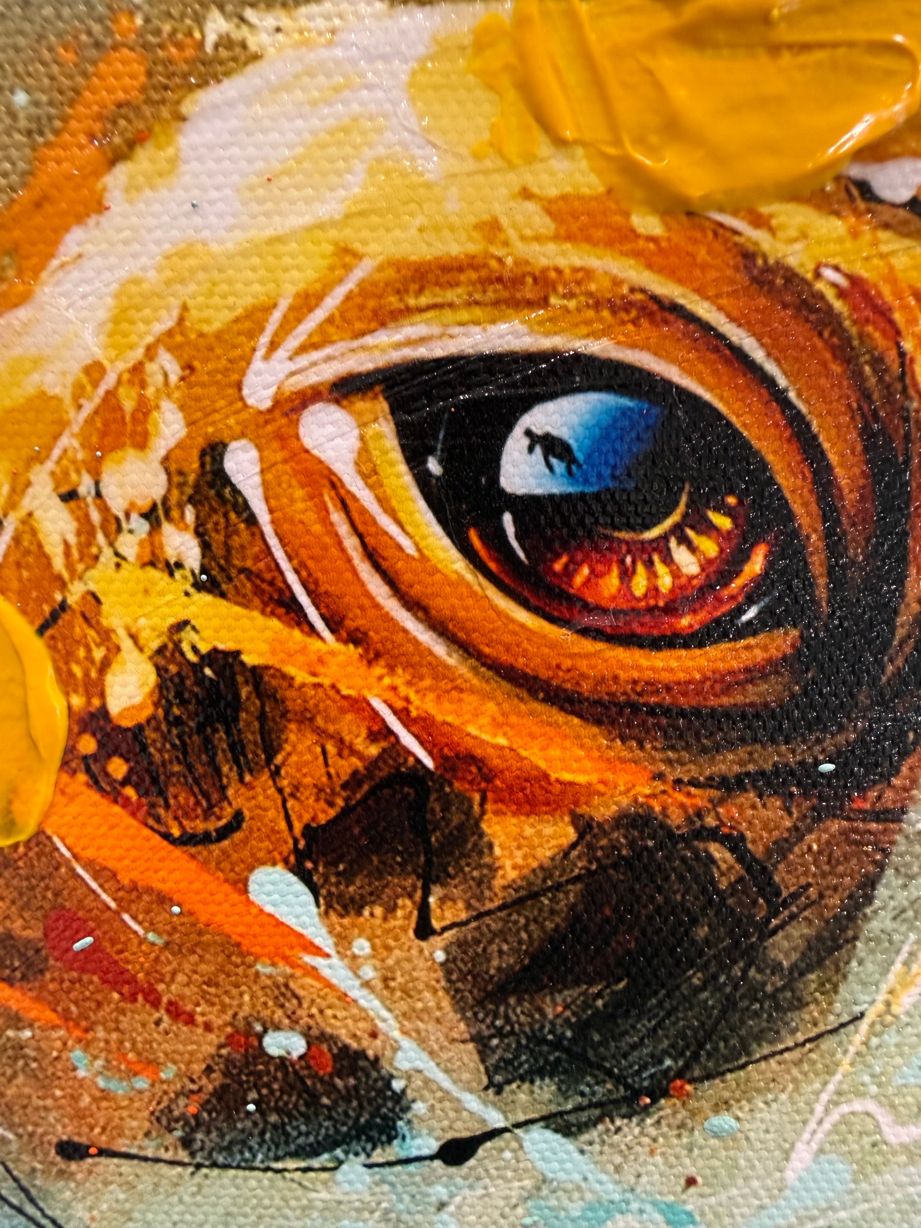 Close-up of a turtle eye with a stylized face and abstract elements