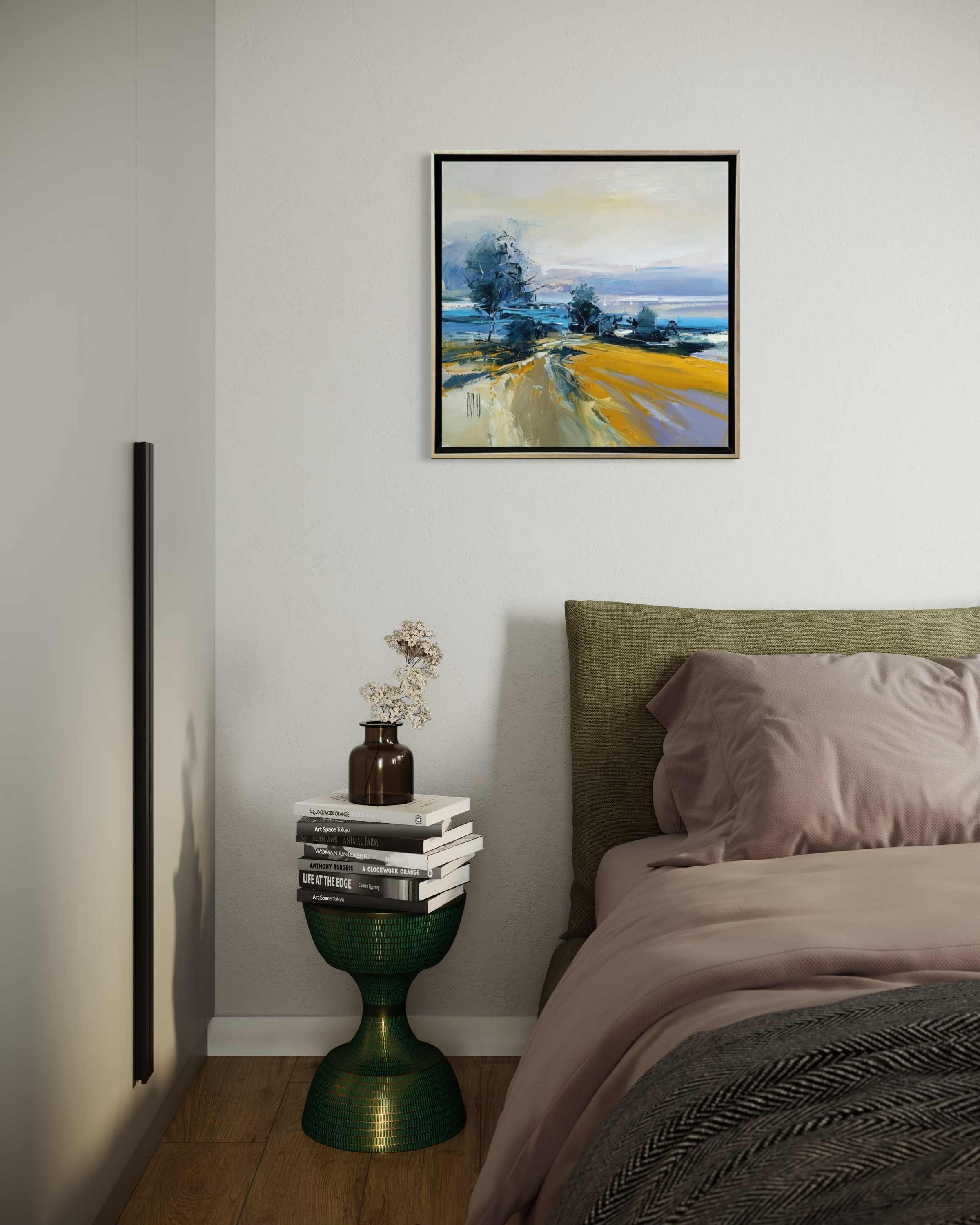 Bedroom with abstract herve lenouvel painting on the wall, green side table, and books.