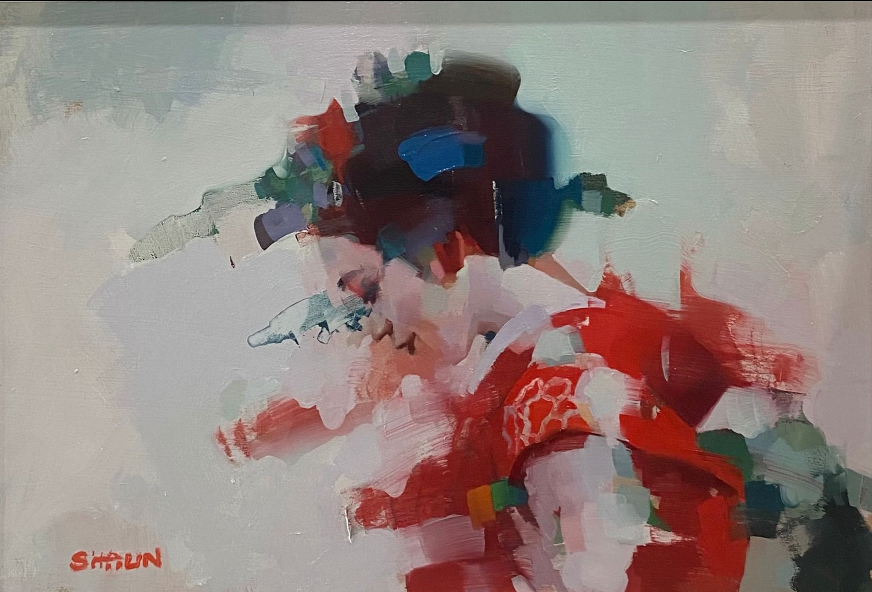 Abstract painting of a geisha with splashes of red, blue, and green on a light background