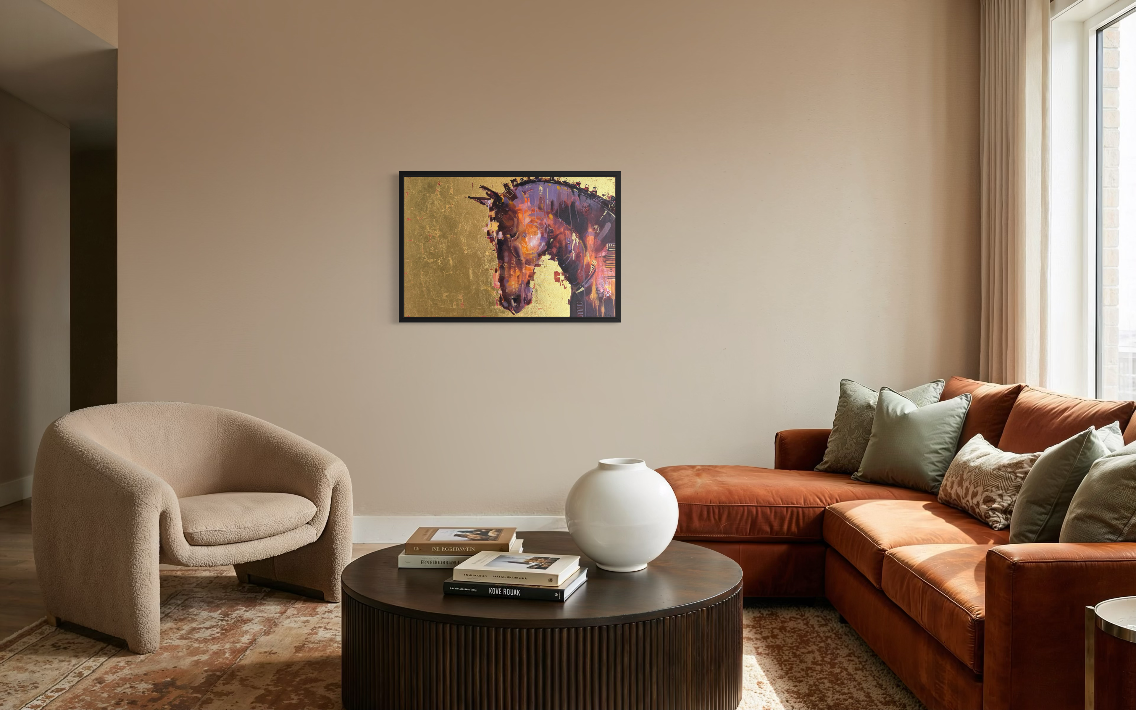 Living room with a brown sectional sofa, beige armchair, and a round coffee table. With horse painting in gold hanging central
