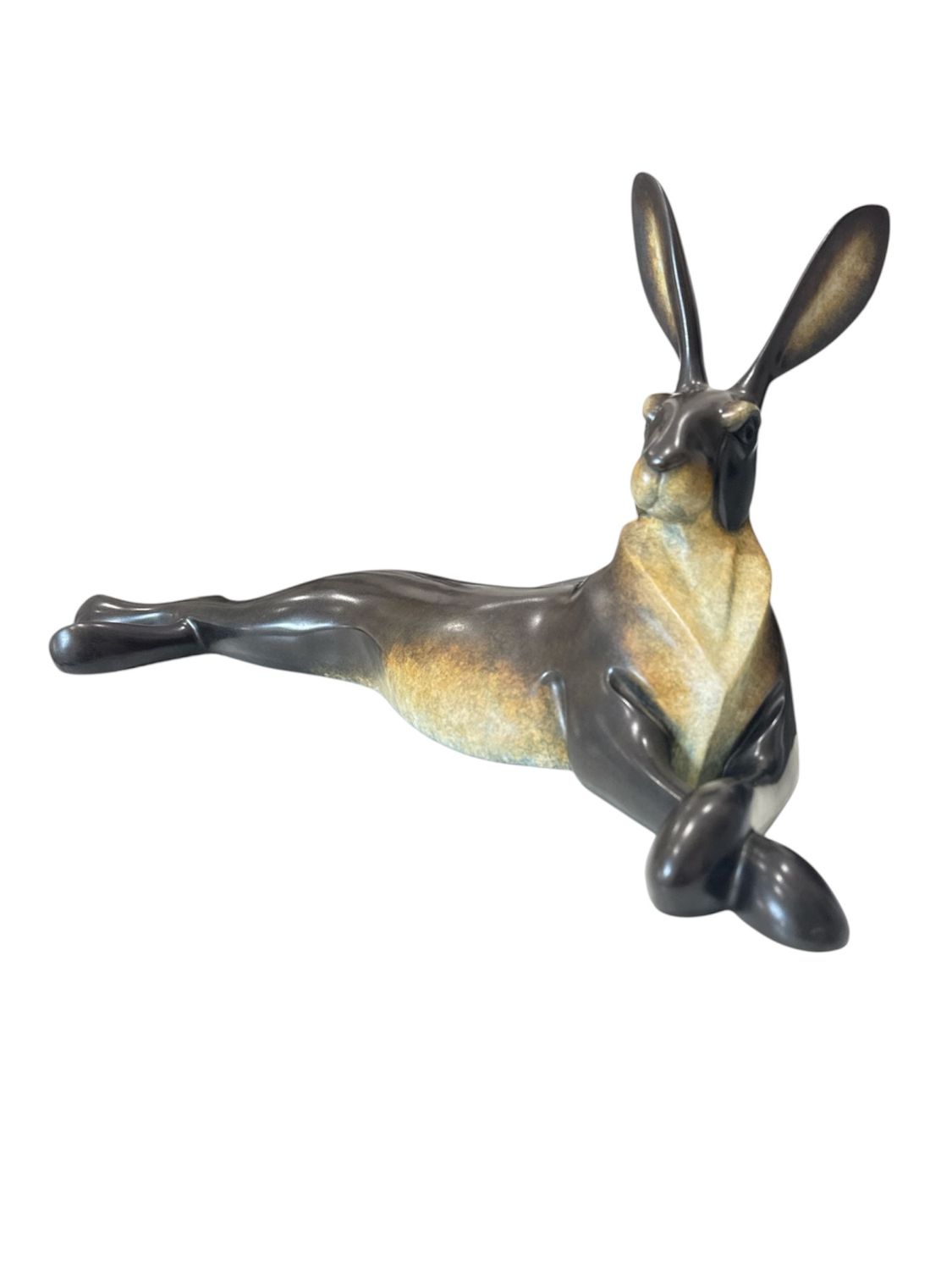 Bronze sculpture of a hare on a white background