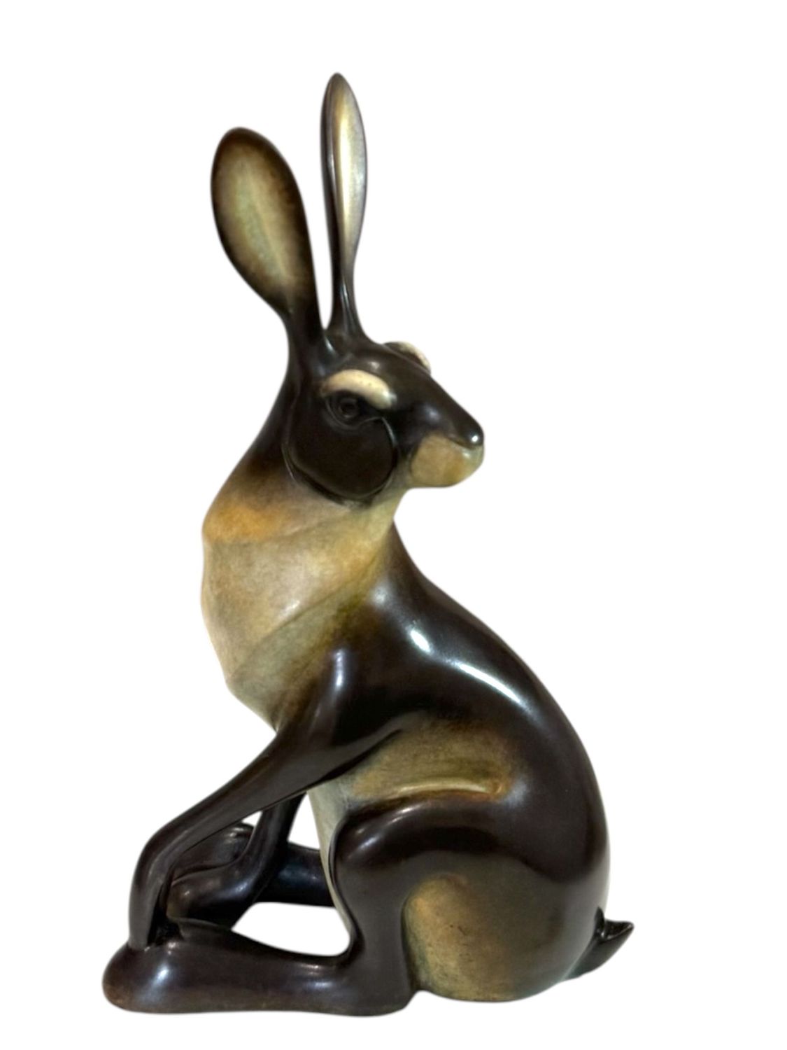 Bronze sculpture of a rabbit on a white background