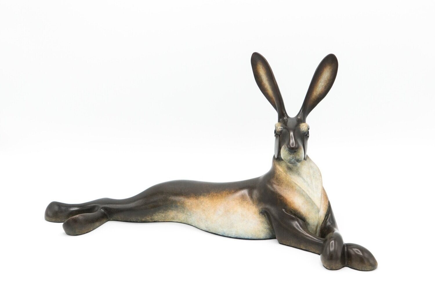 Decorative figurine of a lying animal with a propeller on a white background
