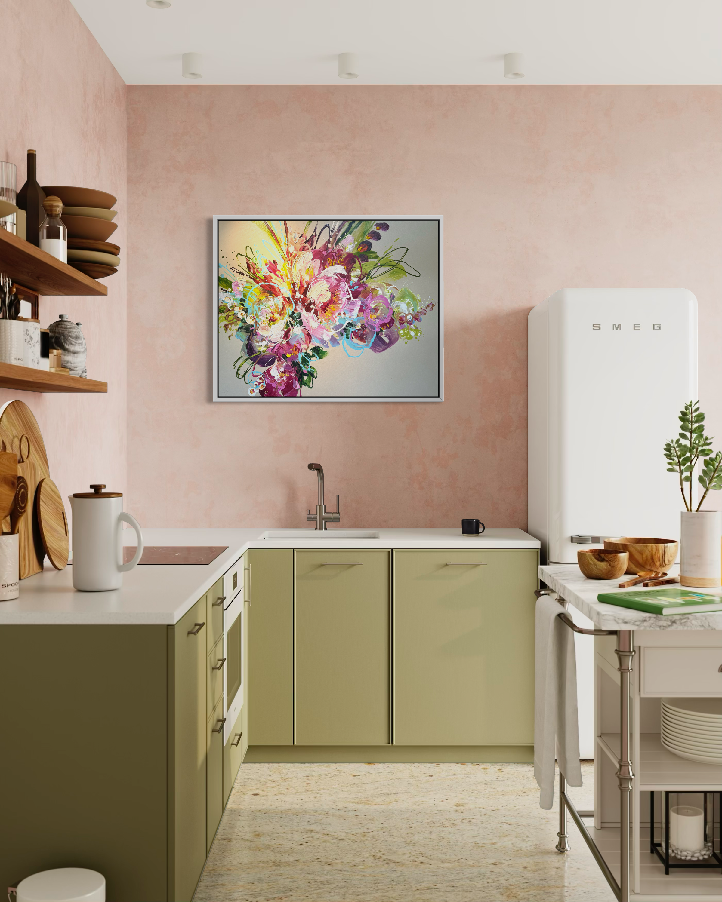 modern kitchen with green cabinets white counter tops with a pink wall with a floral painting hanging central