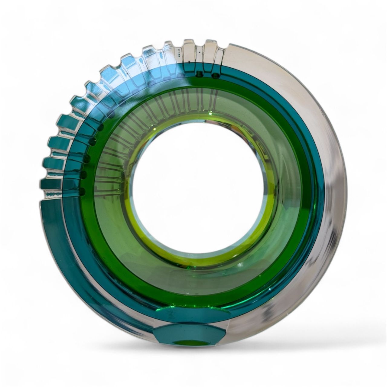 Multicolored circular object with a white background