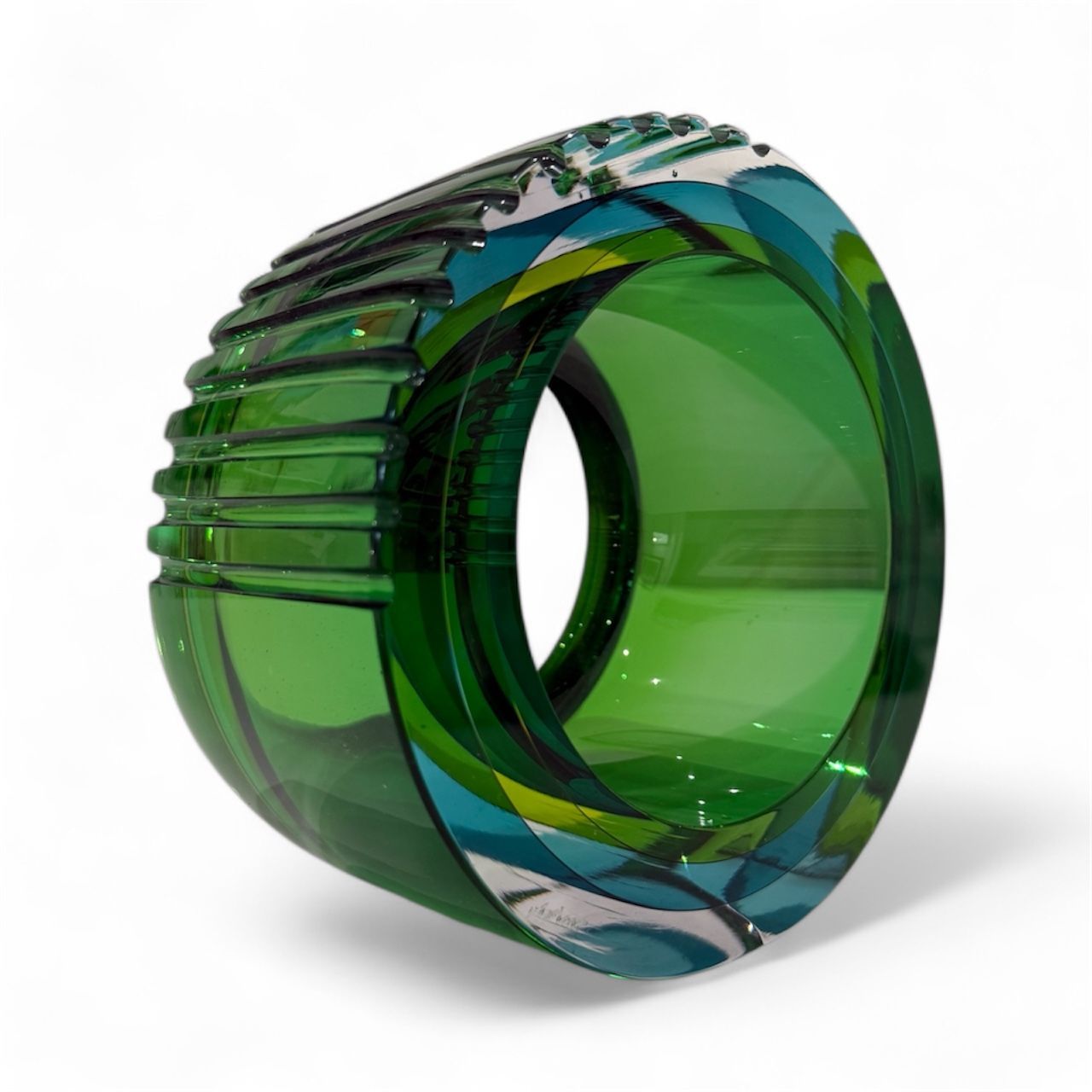 Green and blue transparent ring on a white background