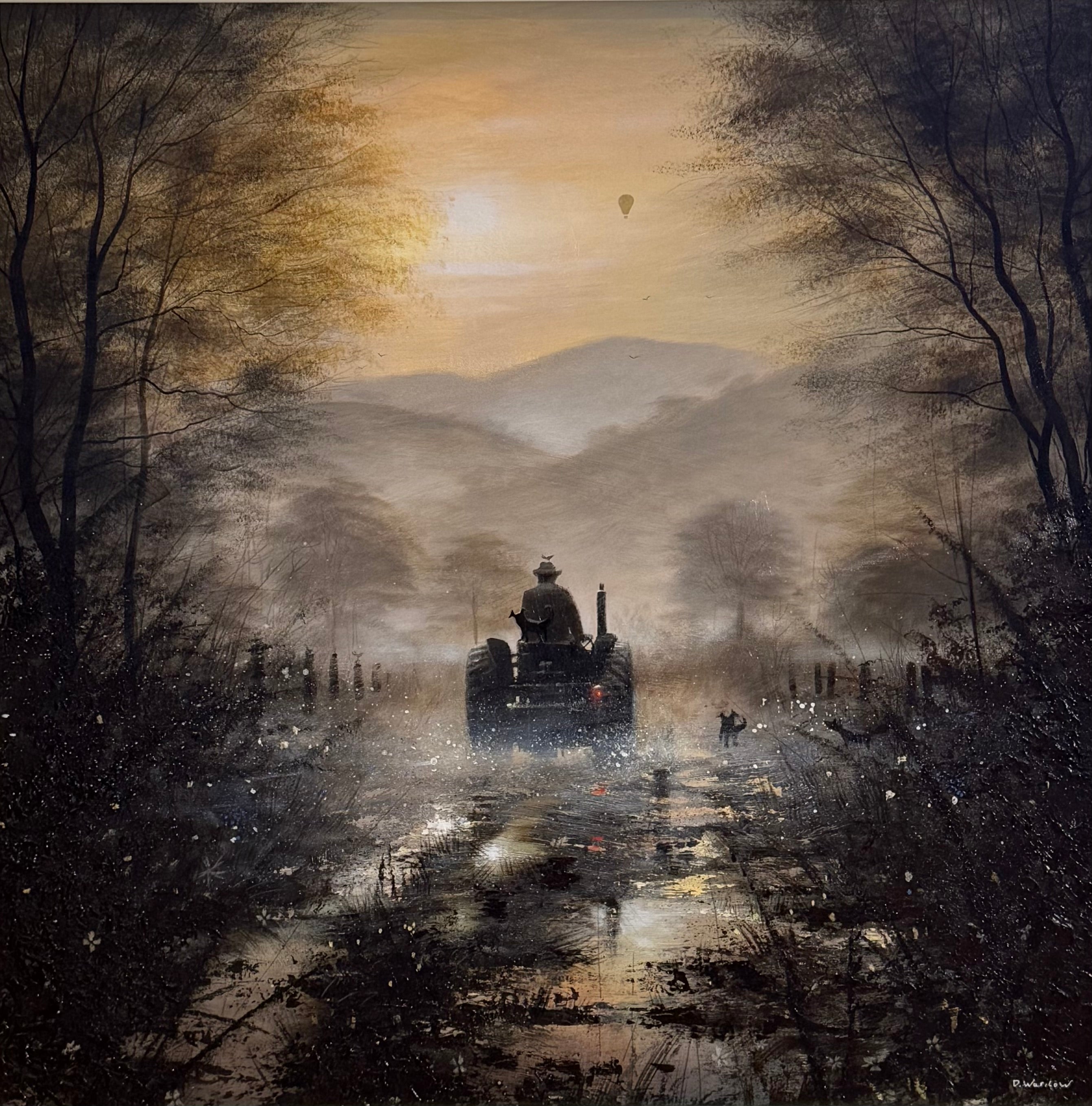 Tractor on a foggy road with mountains and a hot air balloon in the background