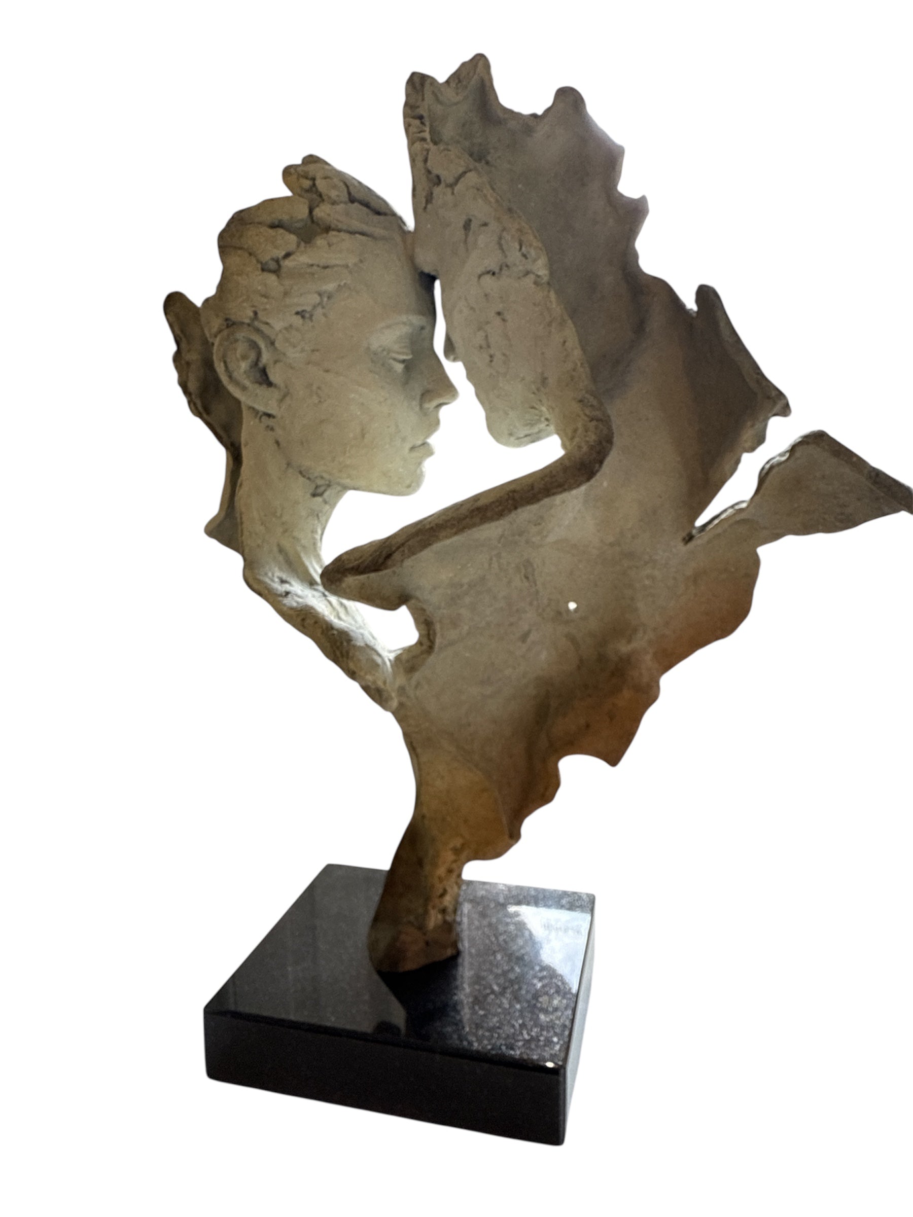 Abstract sculpture of a woman's head and shoulders on a white background