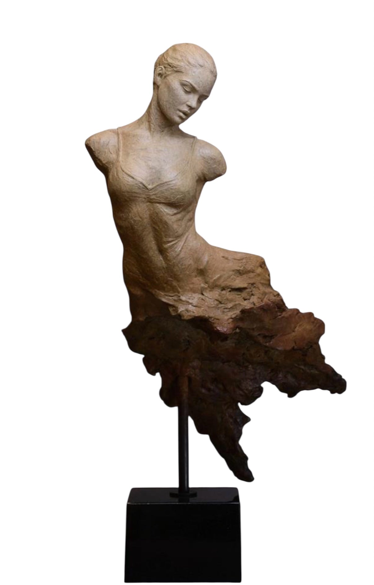 Statue of a woman with a flowing dress on a white background