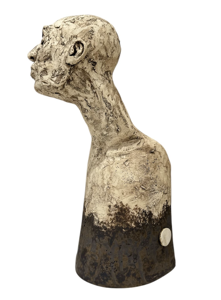 Abstract sculpture of a human figure on a white background