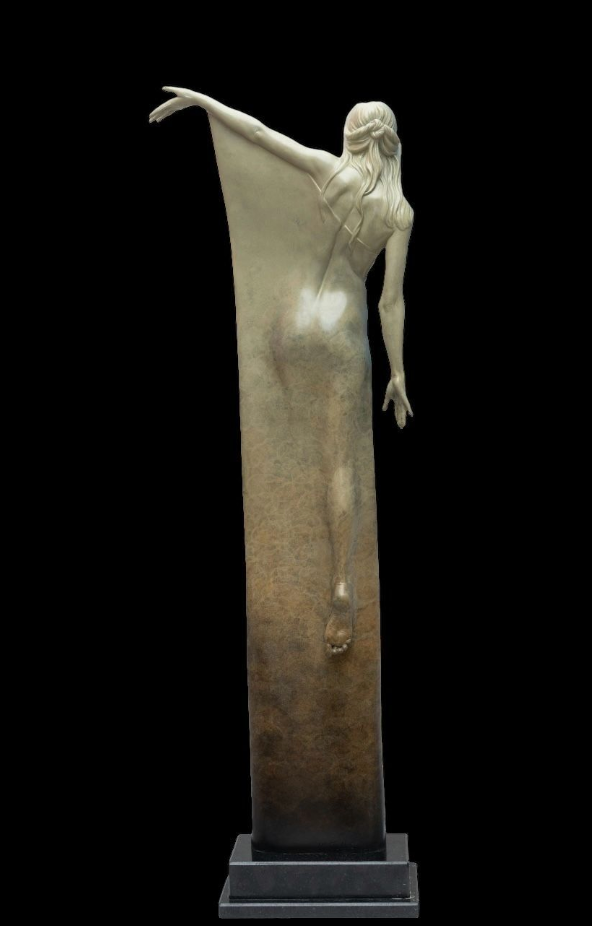 Statue of a woman in a dynamic pose on a black background