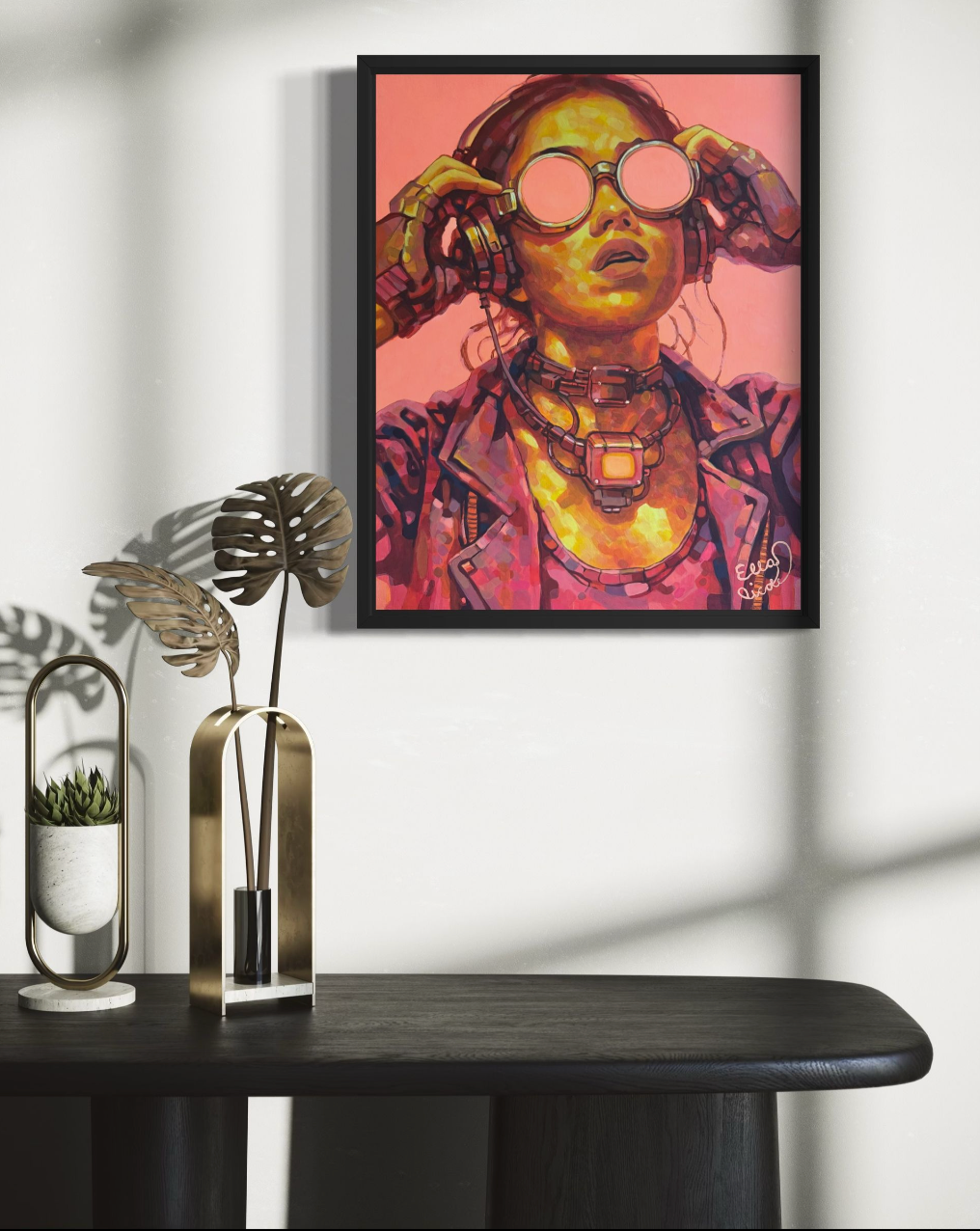 Framed artwork of a person with futuristic goggles on a white wall.