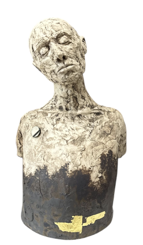 Bust sculpture with a textured surface on a white background