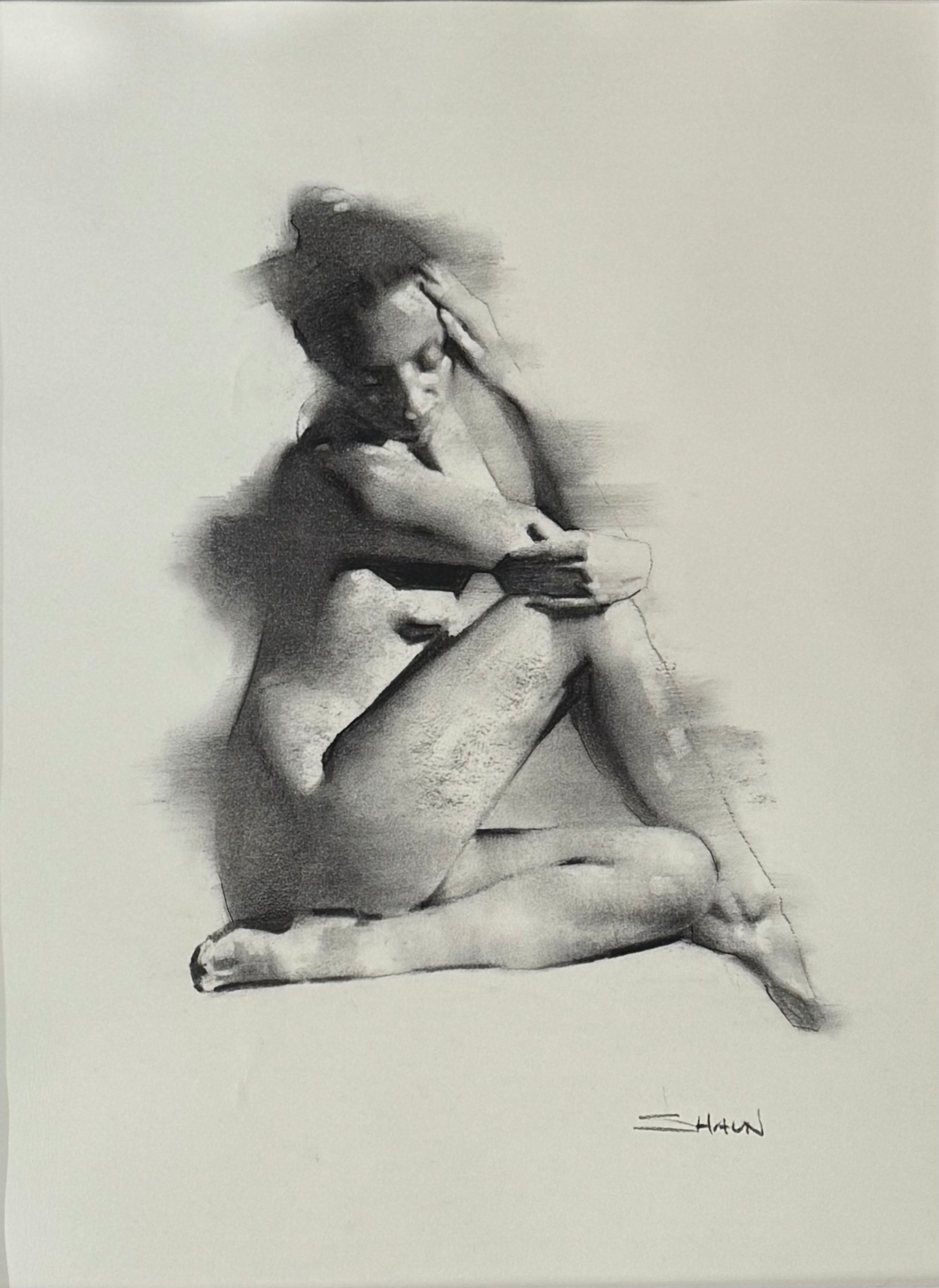 Black and white charcoal drawing of a nude figure sitting on a surface.