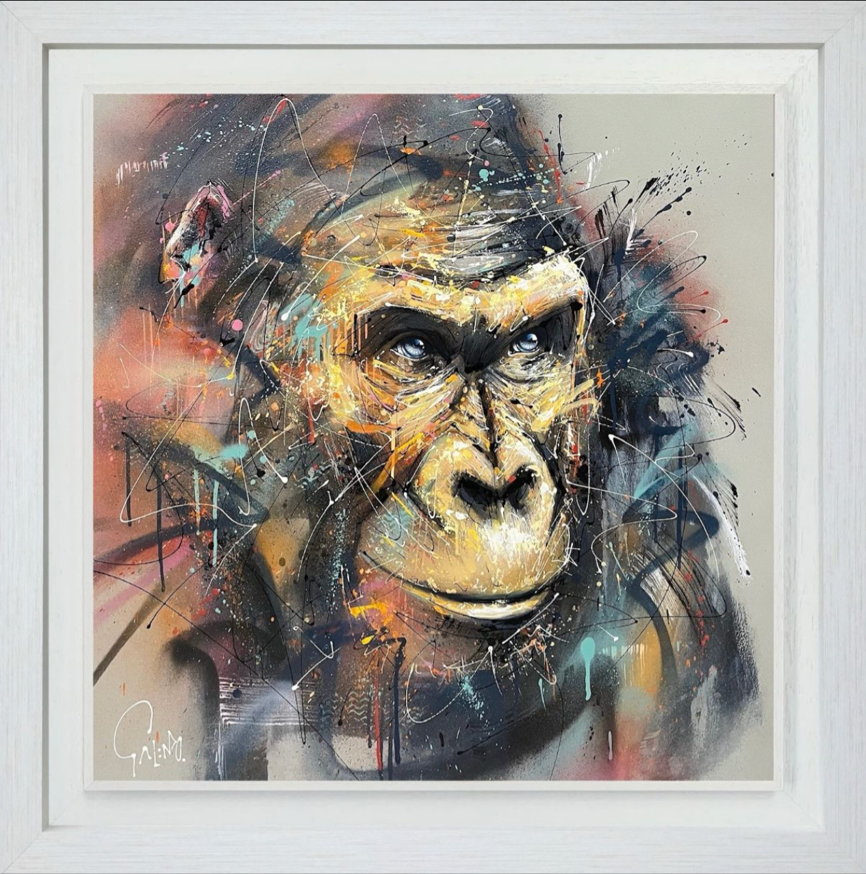 Colorful abstract painting of a gorilla's face in a white frame