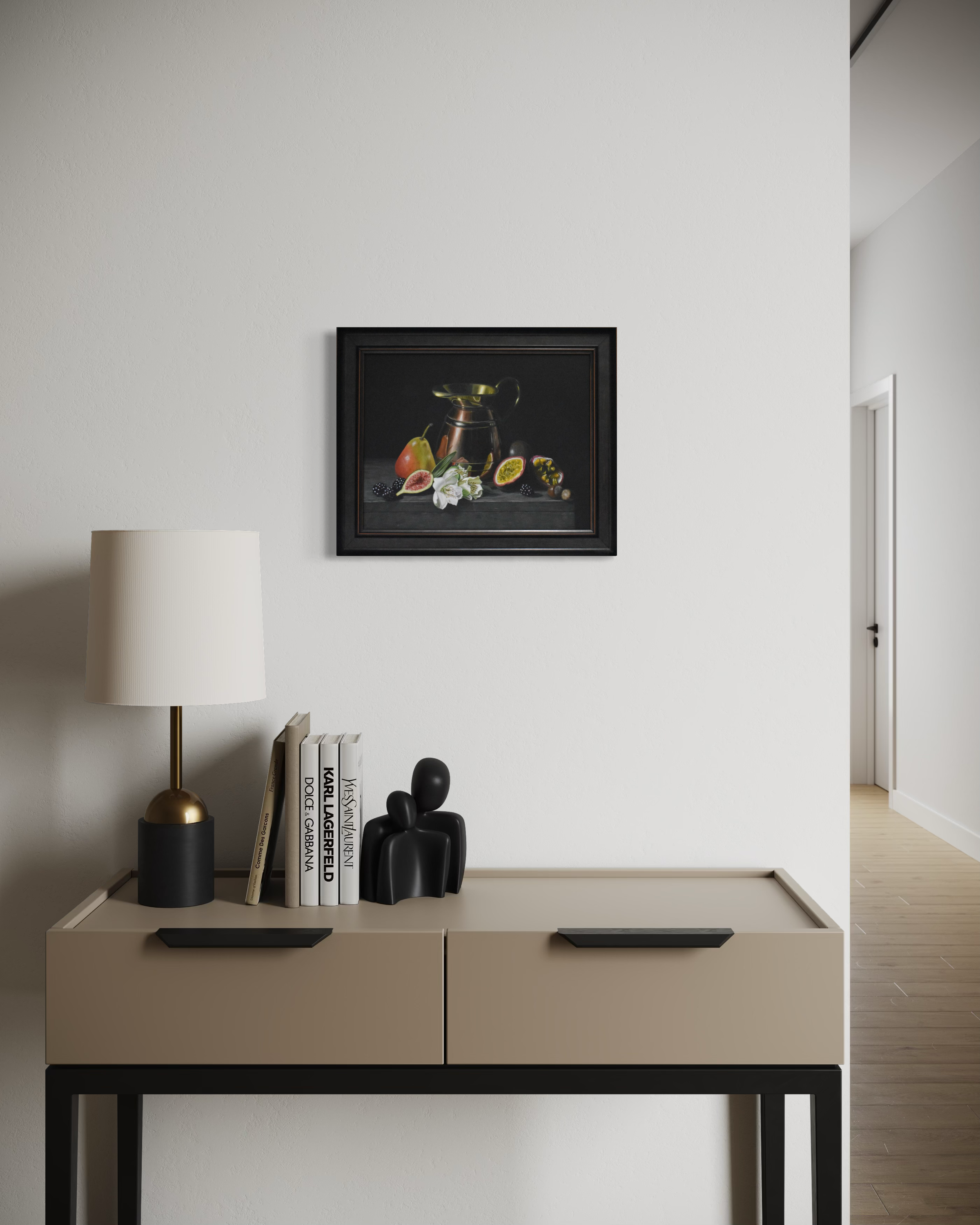 Modern interior with a beige desk, lamp, books, and decorative items.