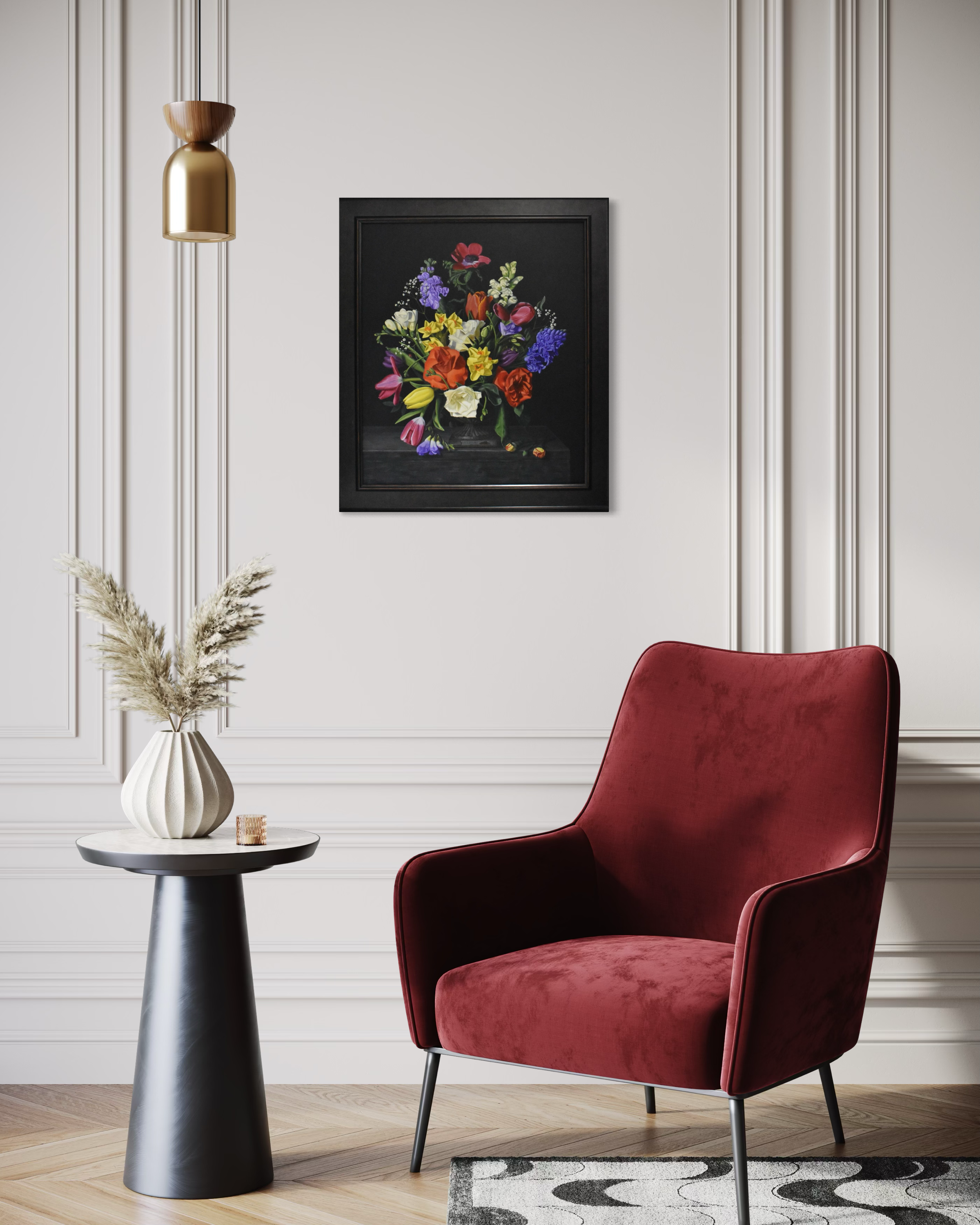 Red armchair in a room with a framed floral artwork on the wall.