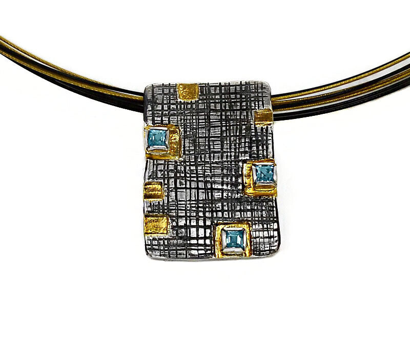 Stylish Topaz, Gold & Oxidized Pendant