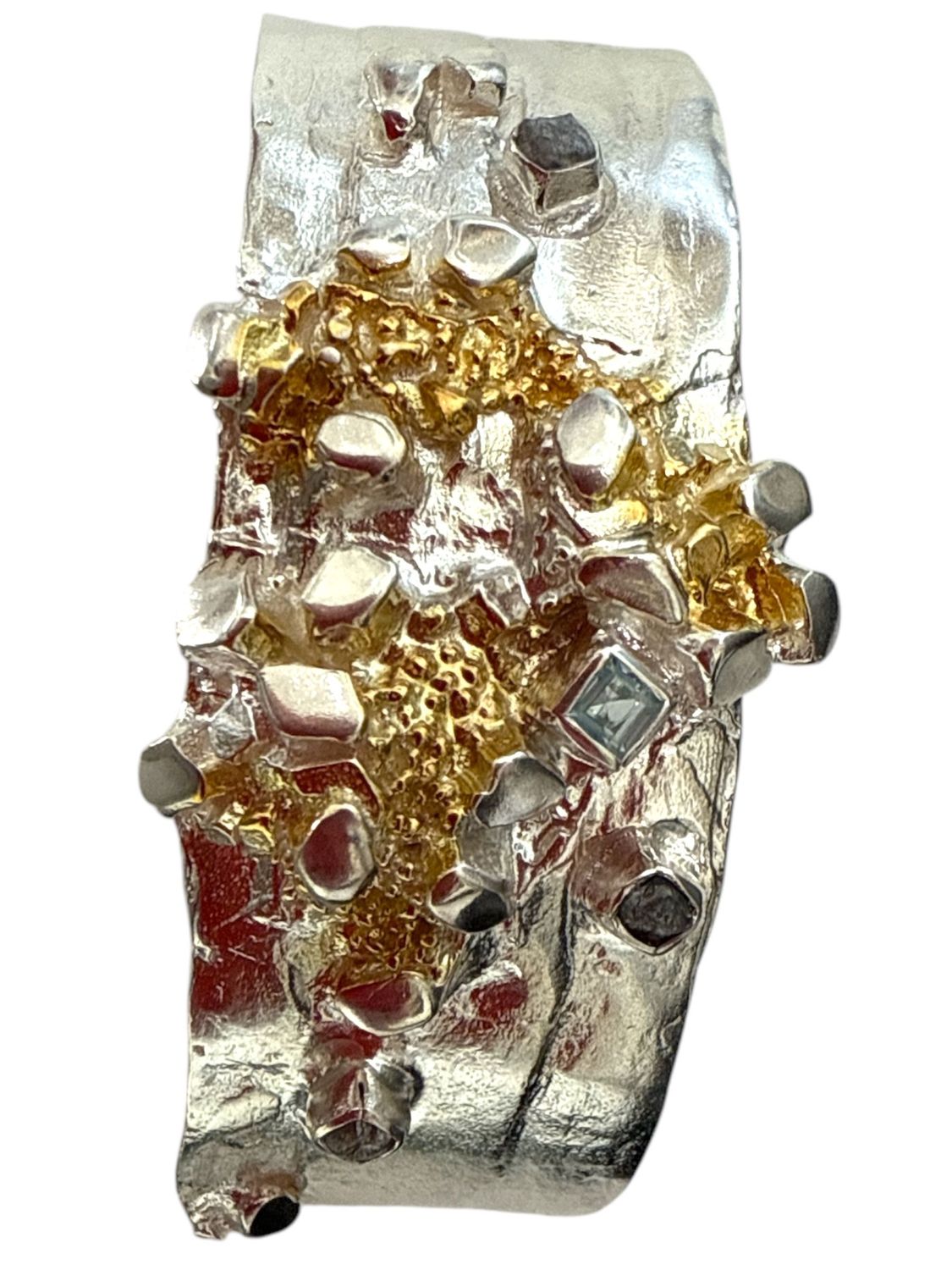 Contemporary blue topaz & rough diamond bracelet