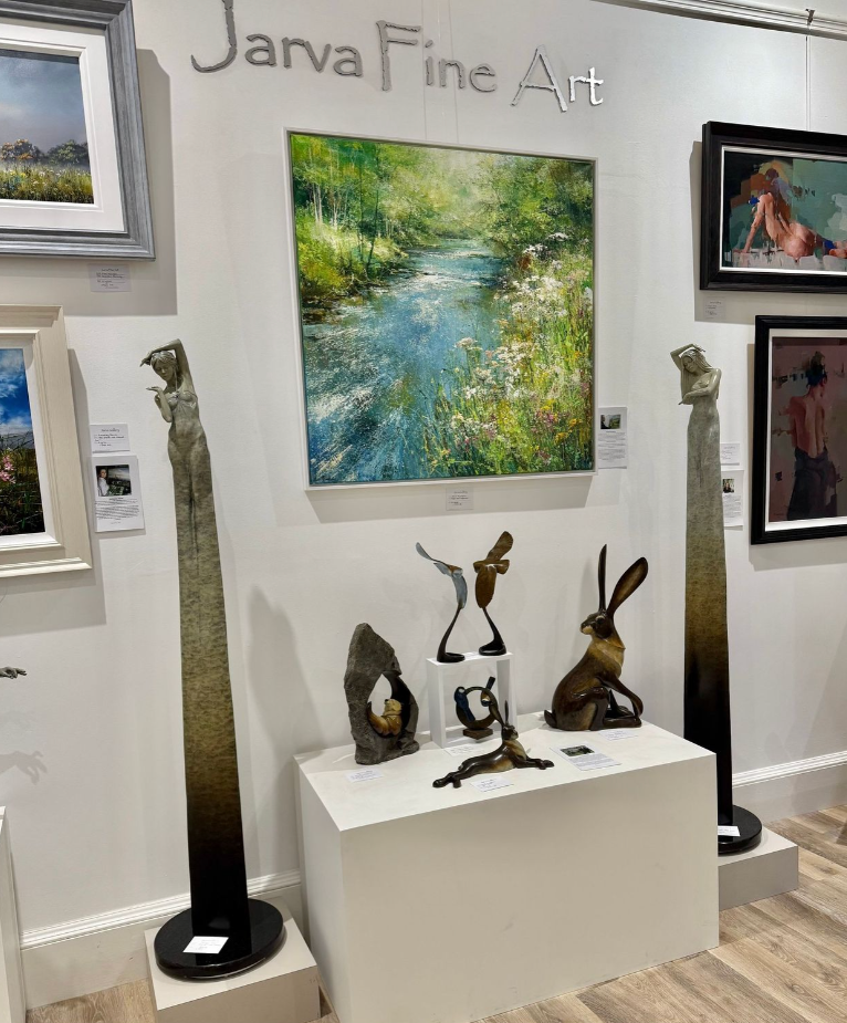 Art gallery with michael talbot sculptures and paintings on display, featuring 'Java Fine Art' branding.