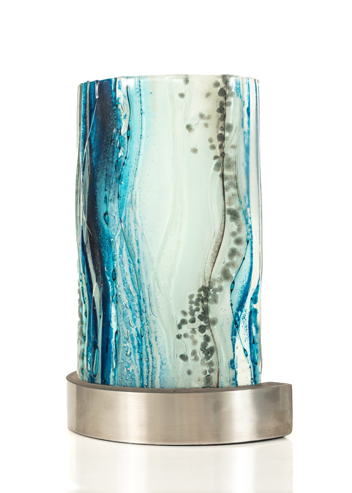 Decorative cylindrical lamp with blue and white marbled pattern on a white background