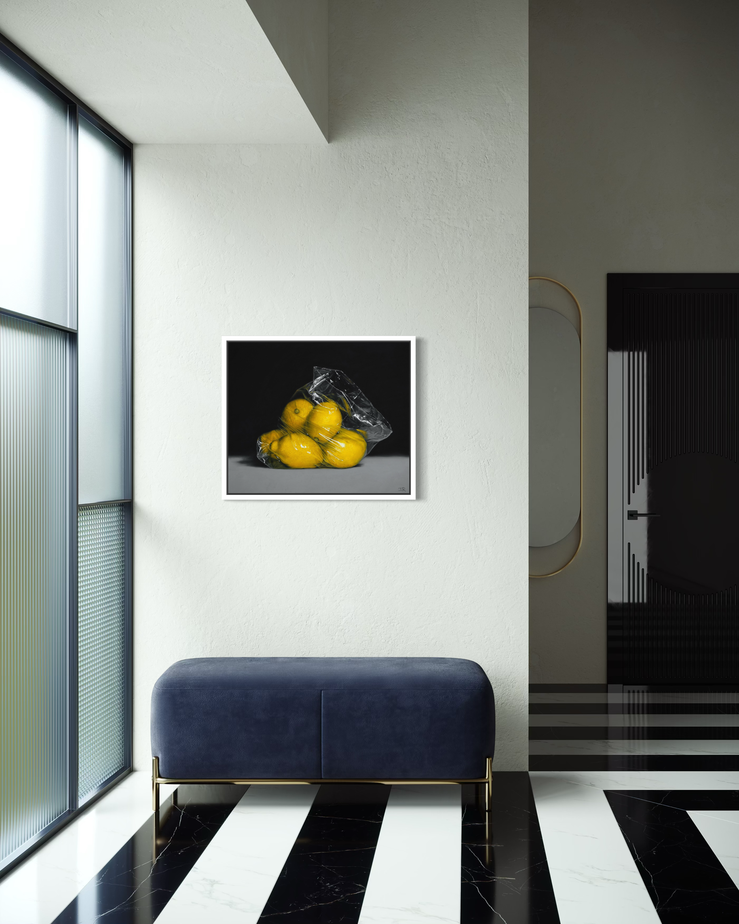 Modern interior with a blue bench, black and white striped floor, and framed artwork of lemons on a gray background.