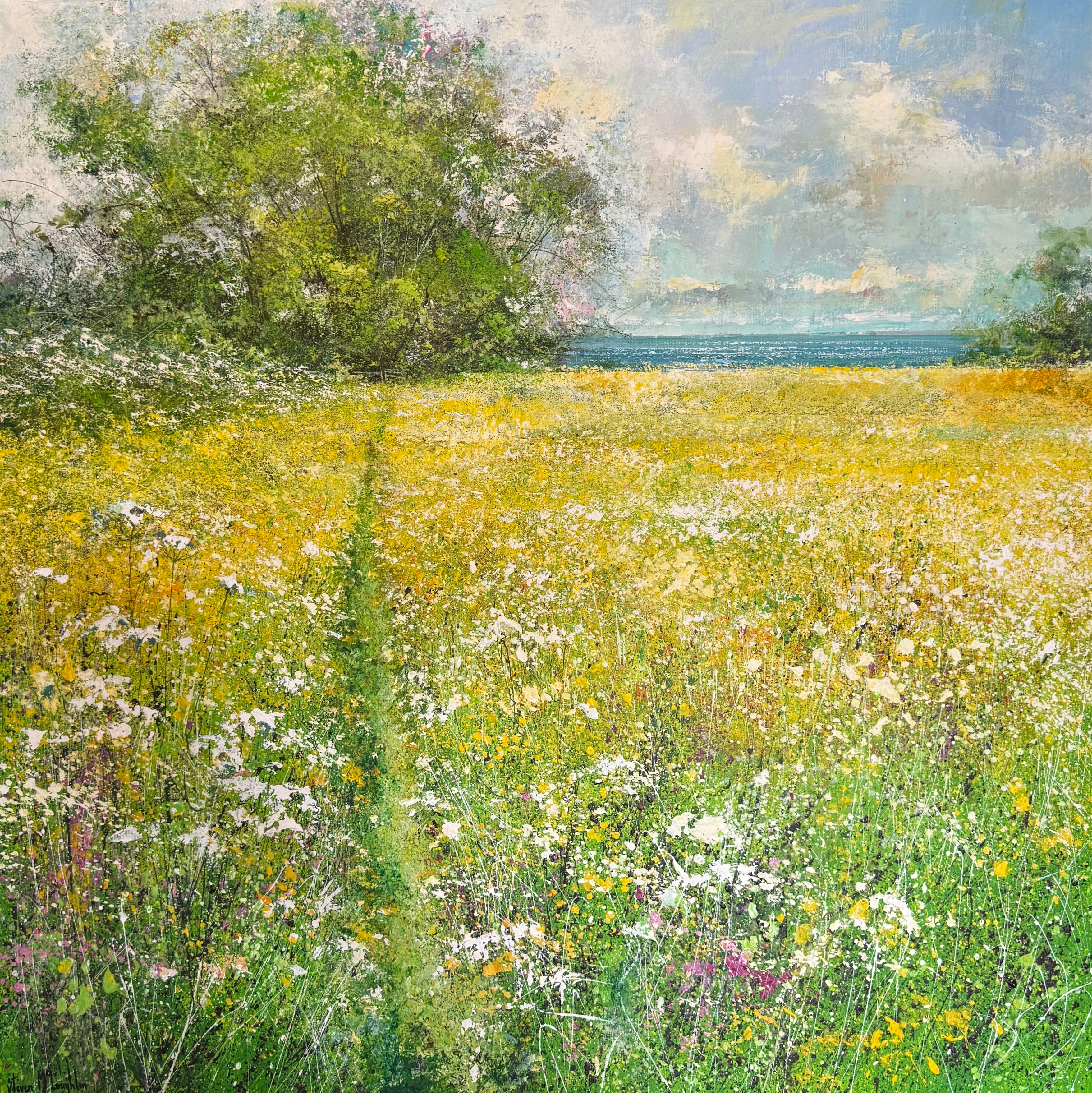 Contemporary landscape painting of a field of bright yellow wildflowers leading to the sea with blue sky above and green trees and hedging of a  British landscape 