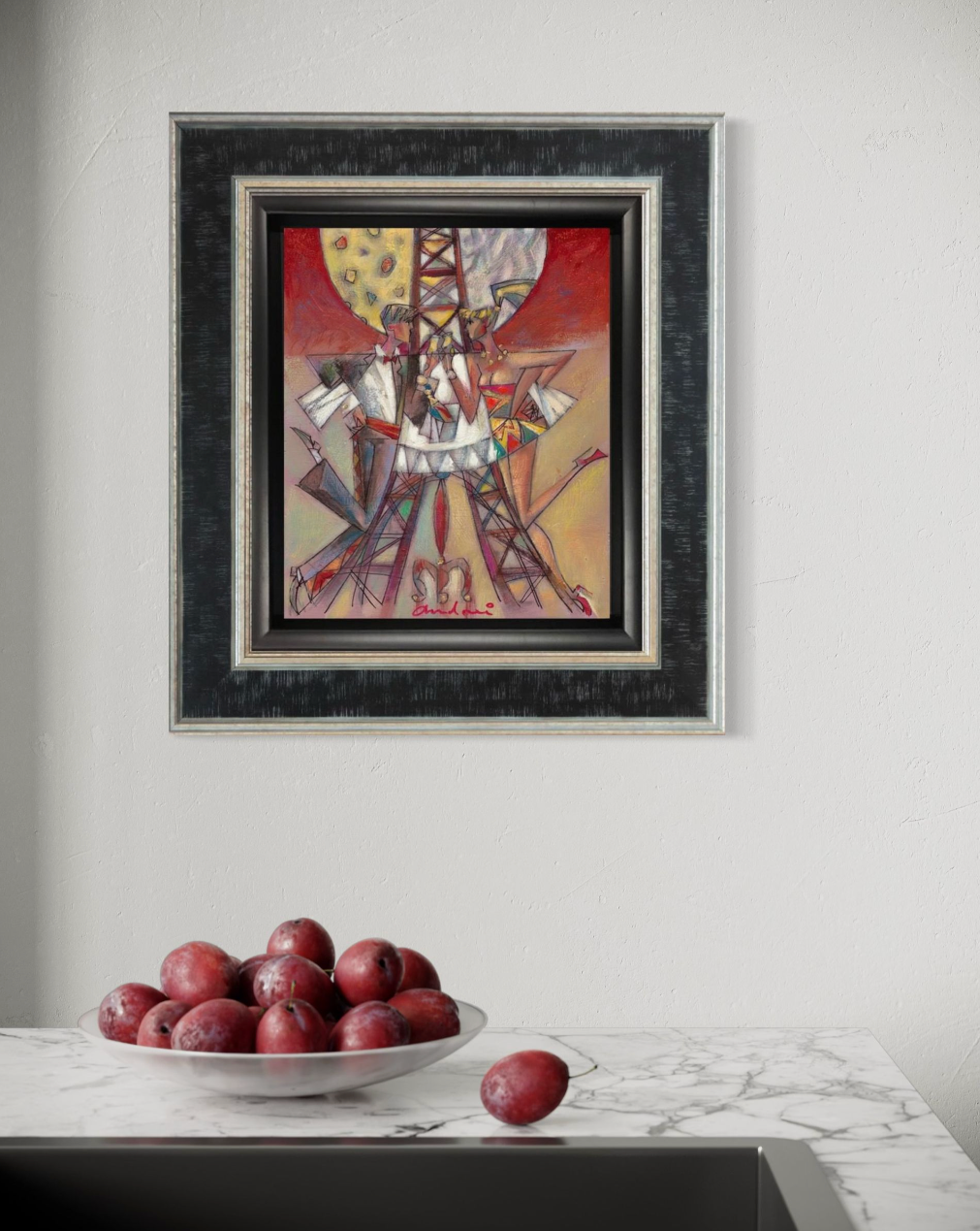 Framed abstract Andrie Protsouk painting on a wall above a marble surface with a bowl of plums.