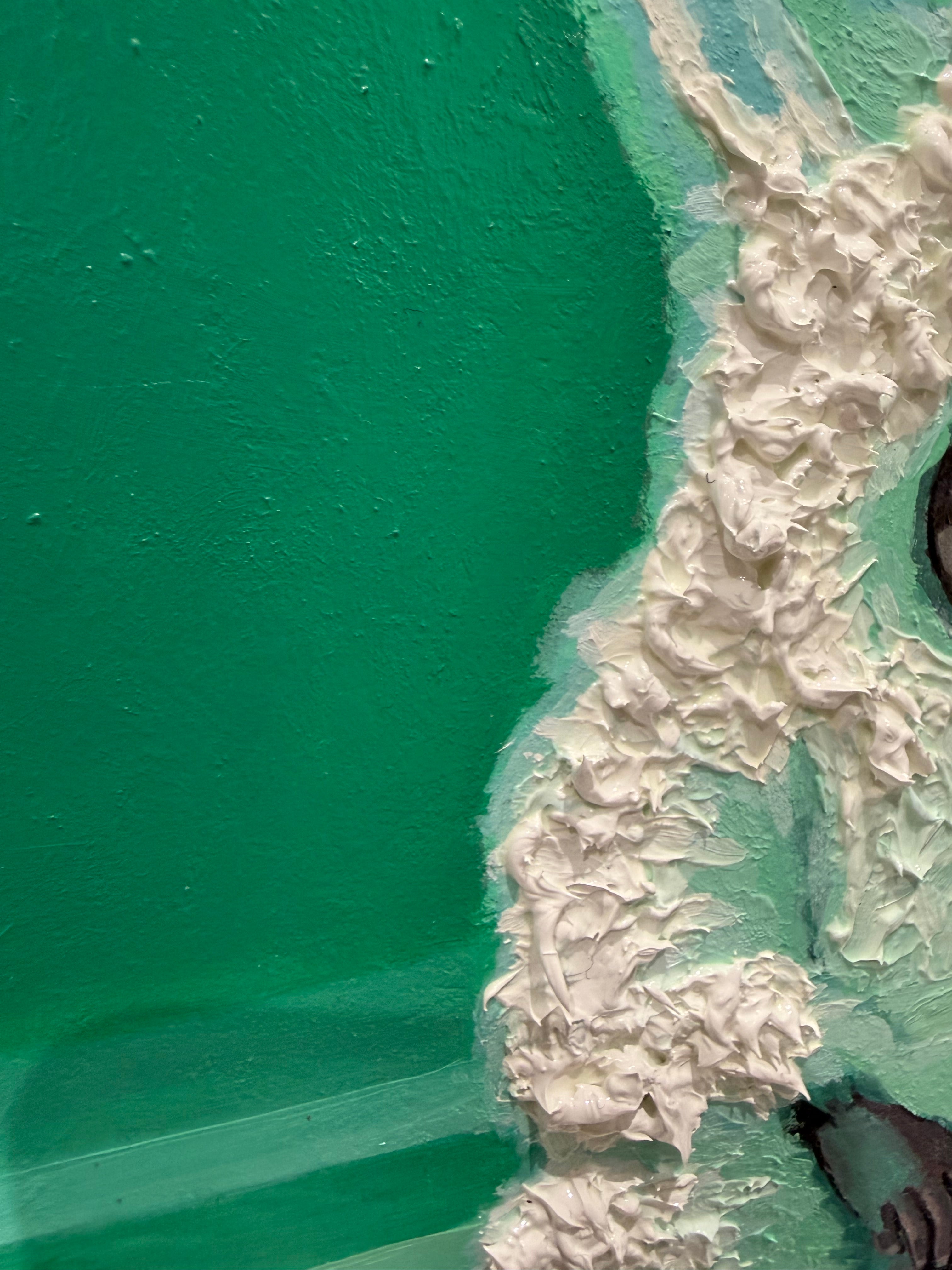 Close-up of white textured paint on a green surface