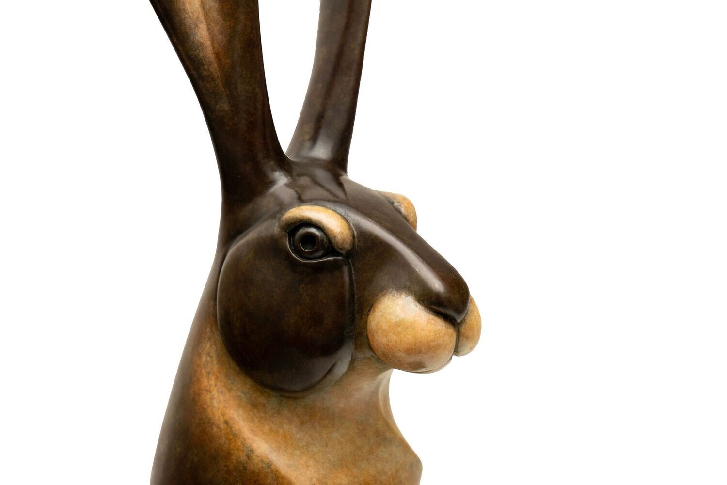 Bronze sculpture of a hare on a white background