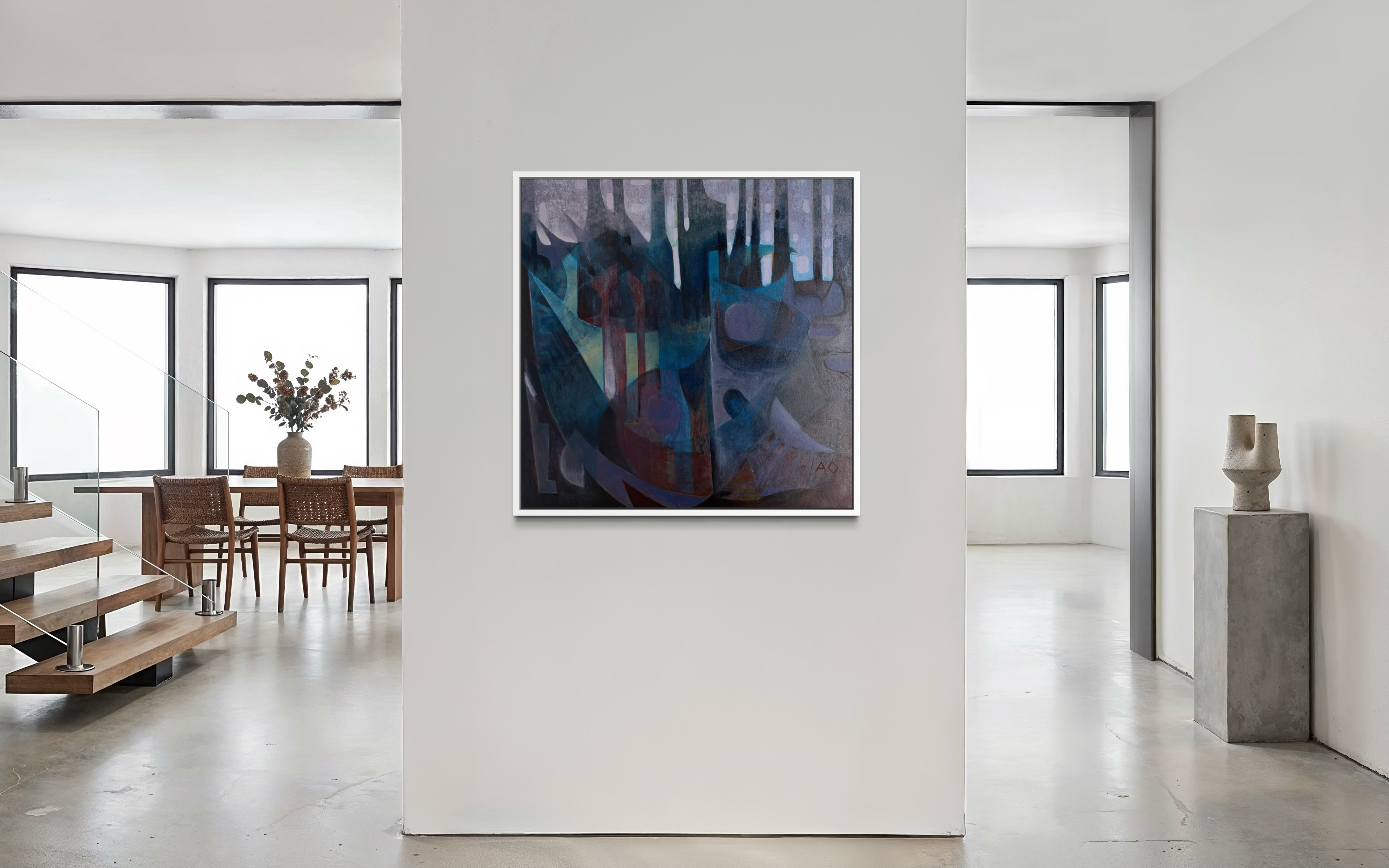 Modern interior with a abstract painting on a white wall