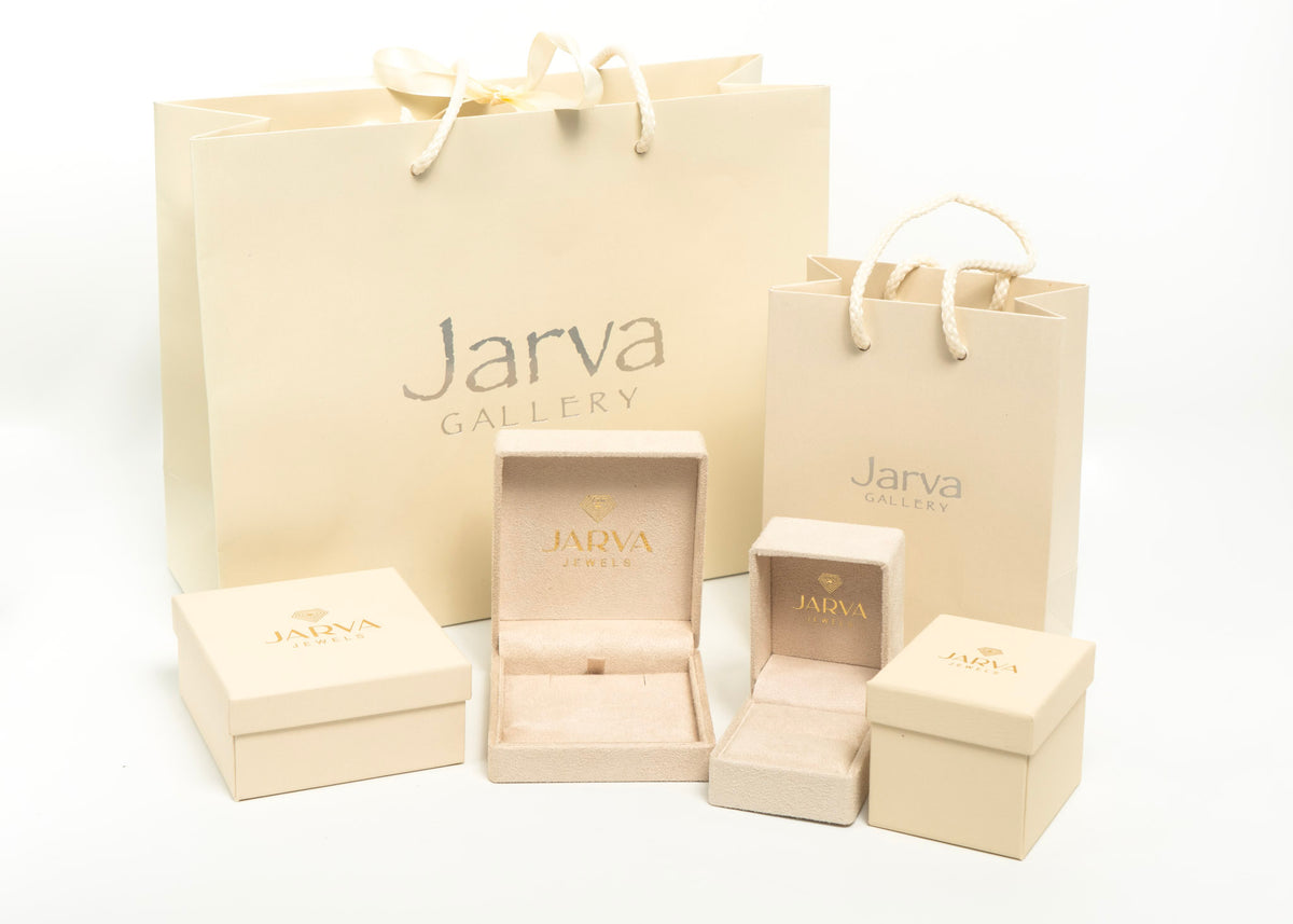 A set of cream-colored Jarva Gallery jewelry packaging, including two shopping bags, two small boxes, one open display box, and one larger open presentation box, all arranged on a white background.