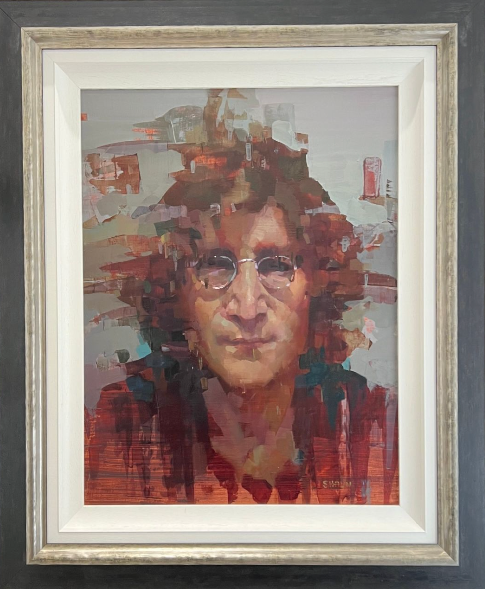 Framed portrait of a john lennon with a colourful abstract design