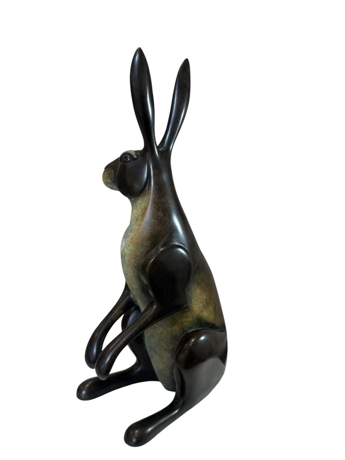 Bronze sculpture of a hare on a white background