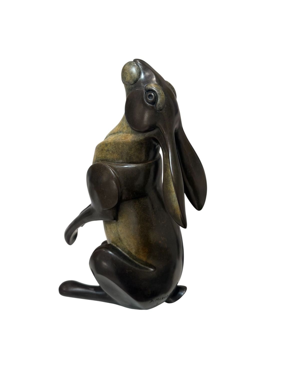 Bronze sculpture of a rabbit on a white background