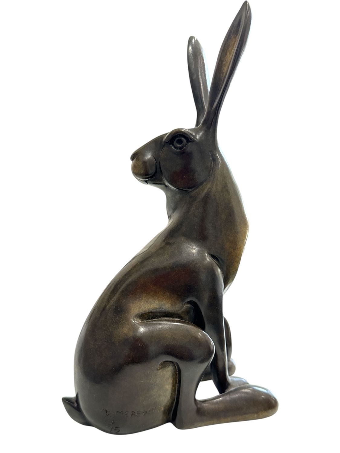 Bronze sculpture of a rabbit on a white background