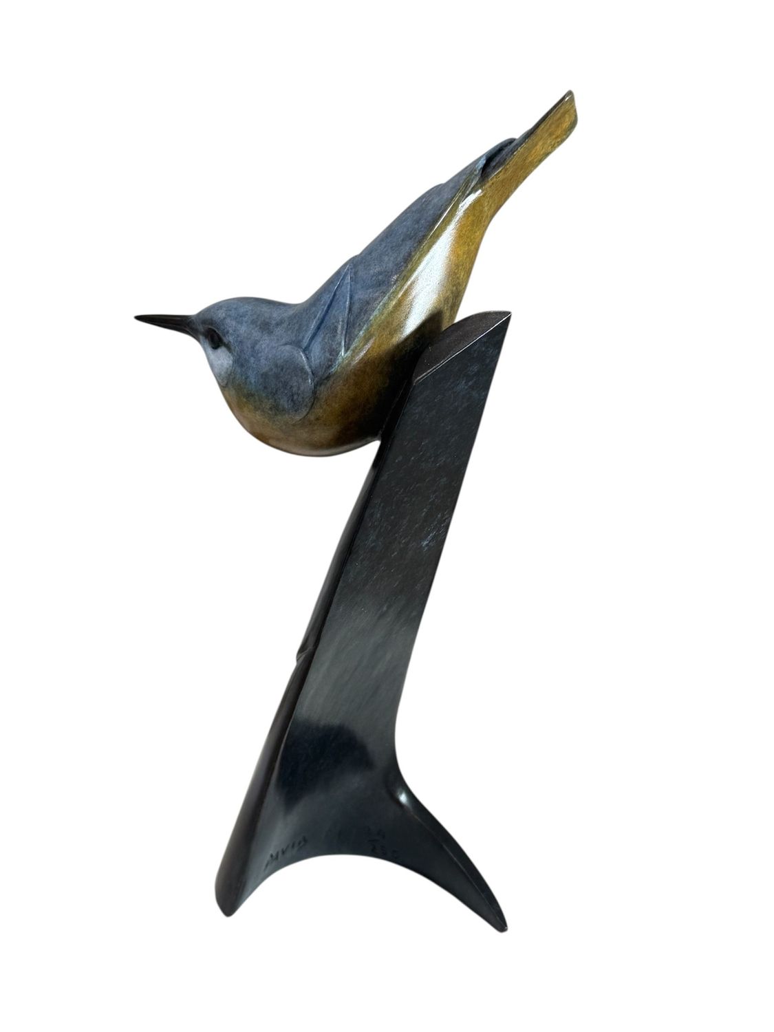 Bronze sculpture of a bird perched on a black stand against a white background