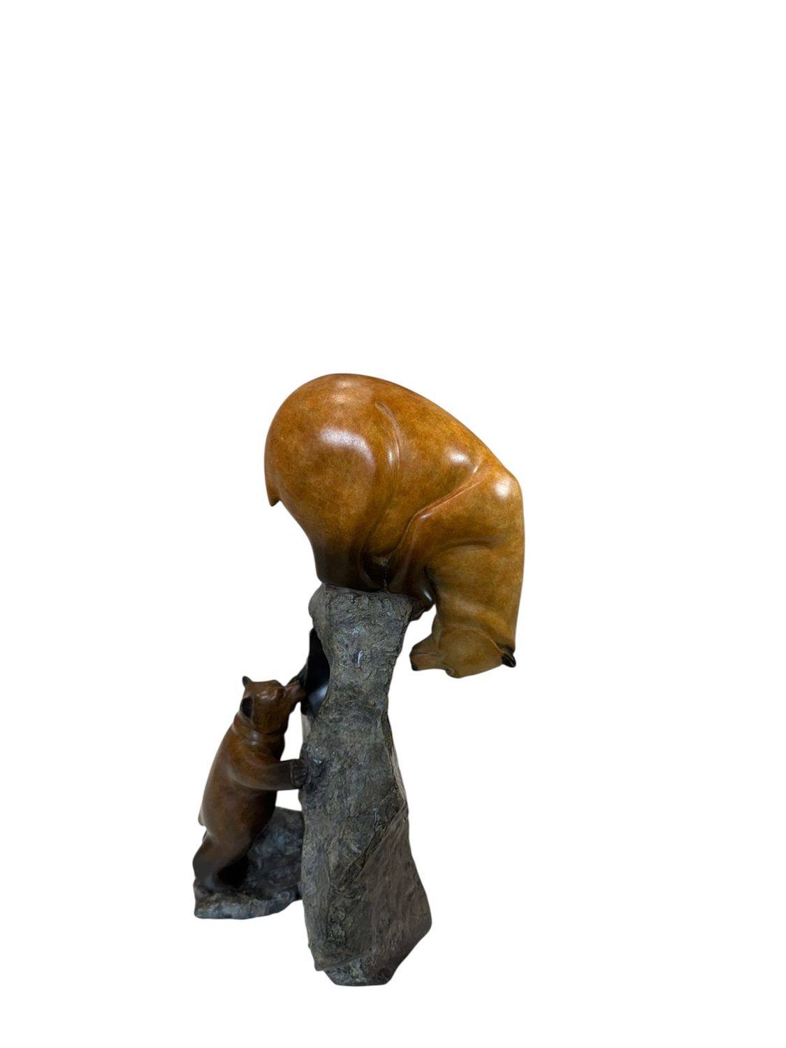 Statue of a large bear with a smaller cub on a white background