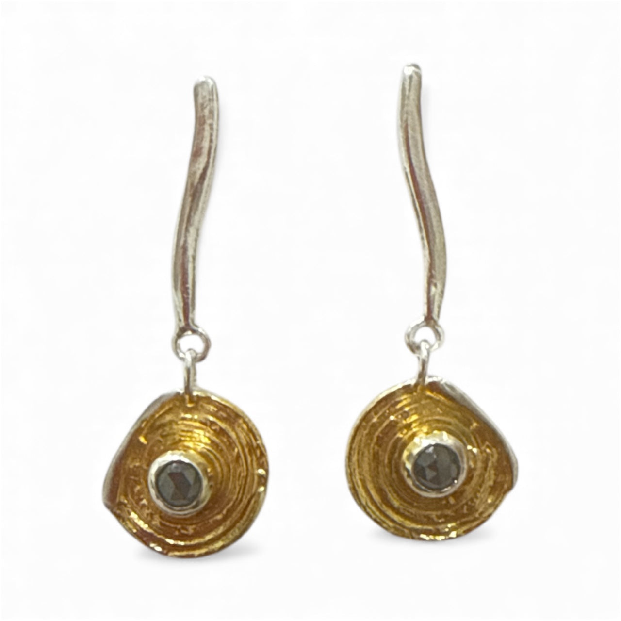 Stylish contemporary Drop earring with black Diamond detail.