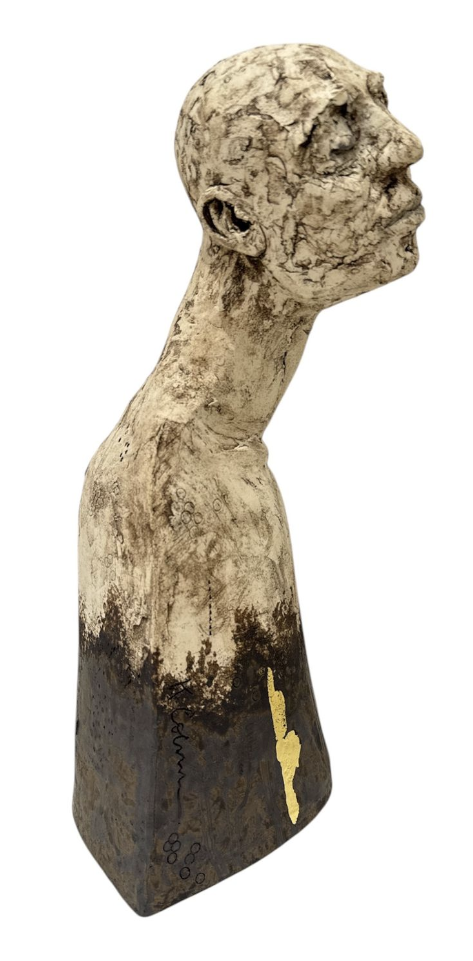 Abstract sculpture of a human figure on a white background