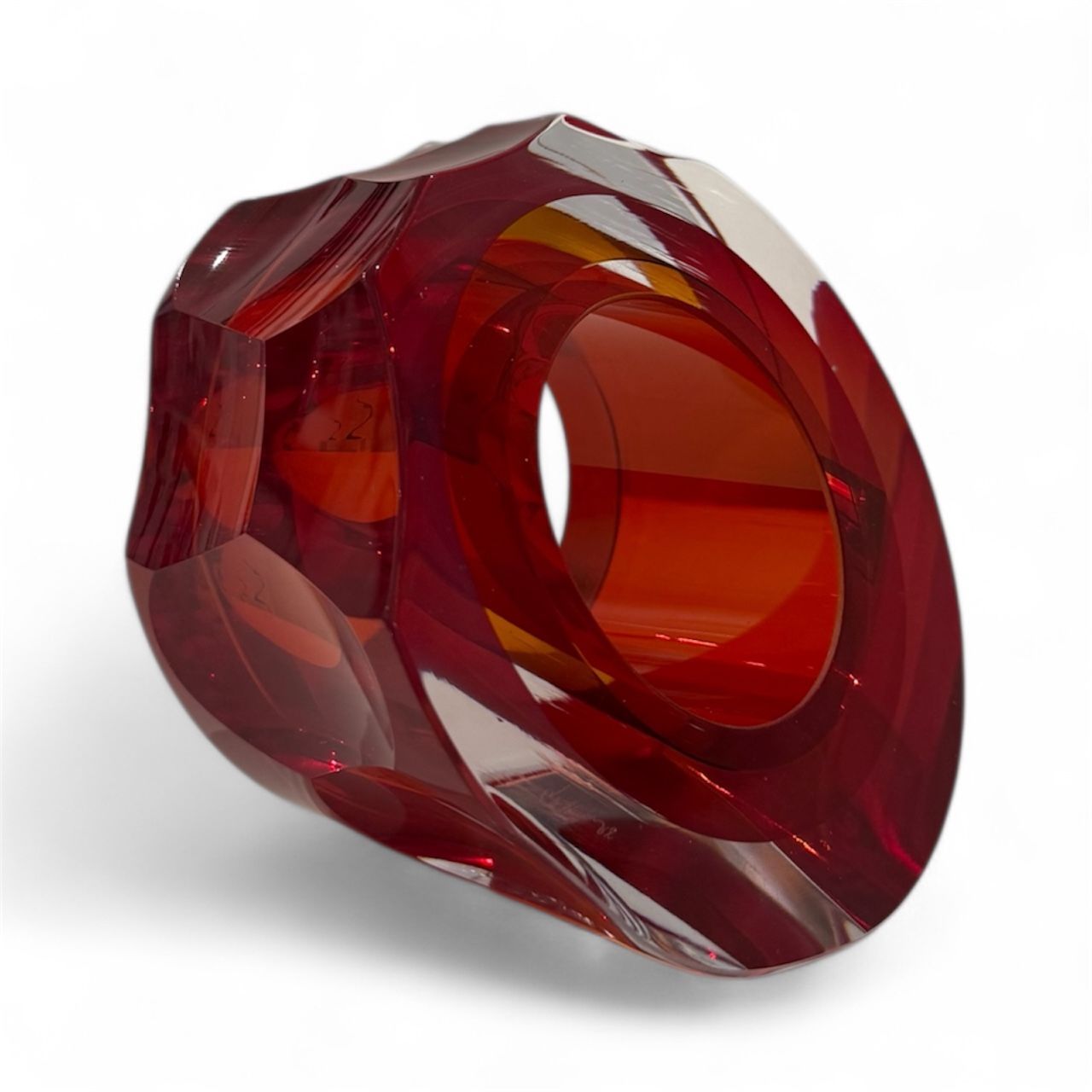 Red and clear glass bowl on a white background