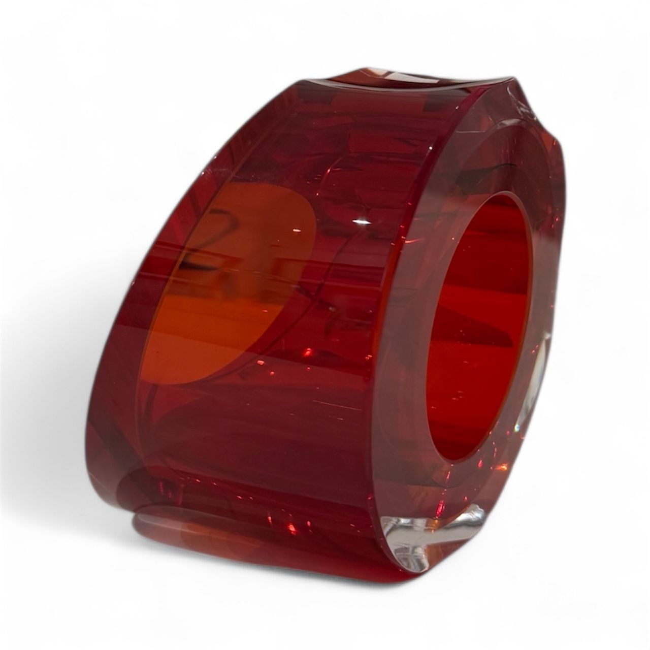 Red transparent tape roll on a white background